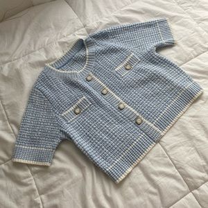 Blue knit button-up crop top